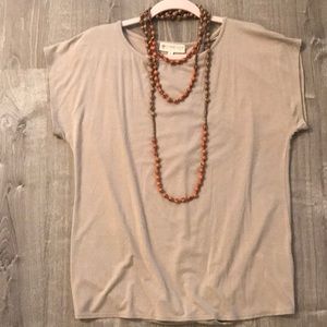 synergy top with cross-over back detail. NWOT